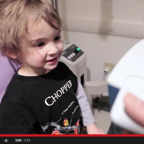 Screenshot of video about a pediatric vision scanner